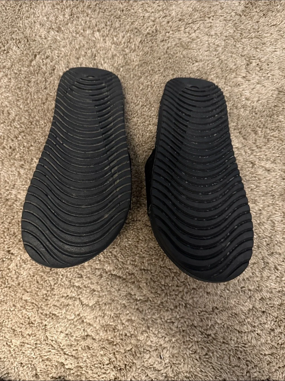 Nike Kids Black Slide Sandals with White Swoosh Logo